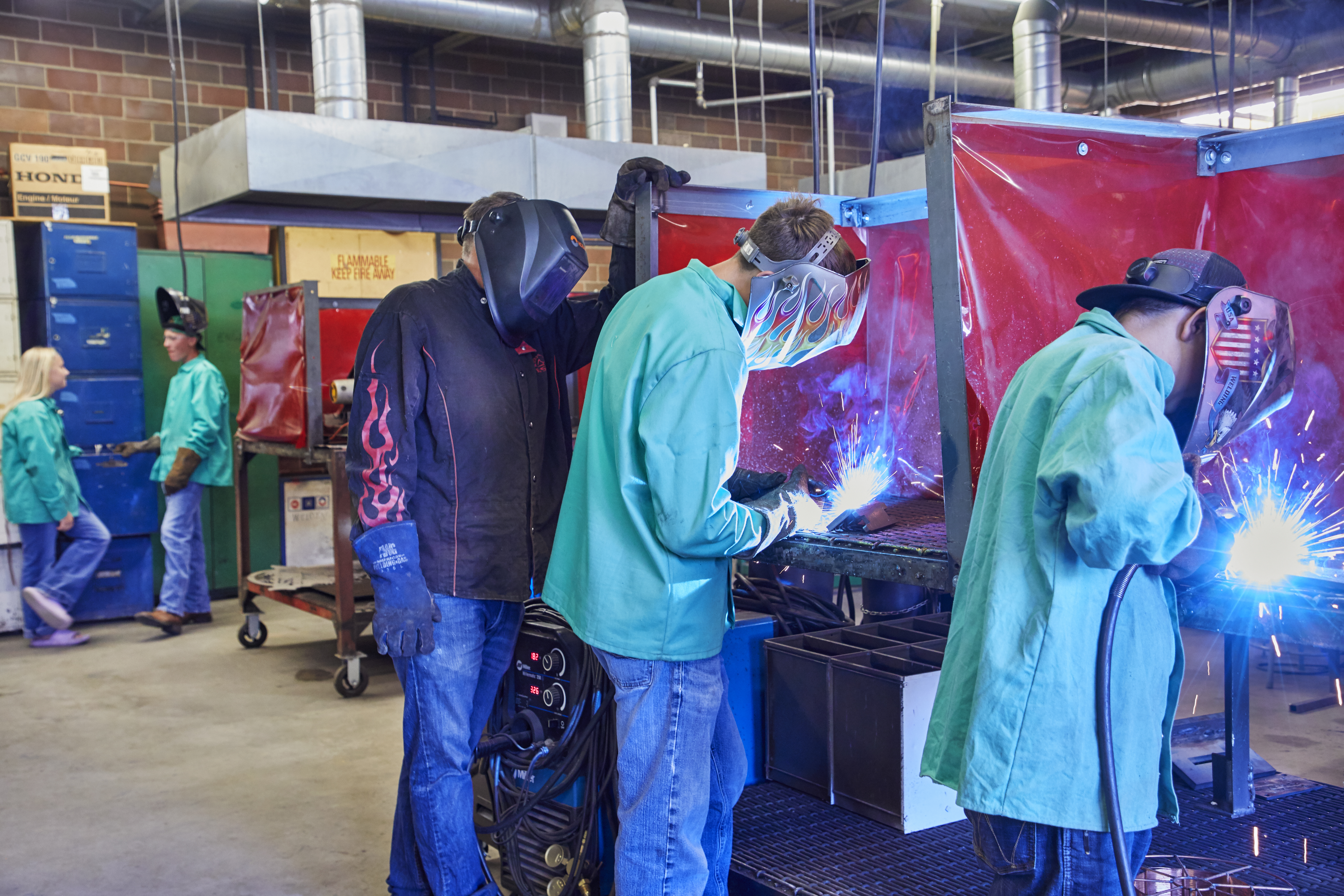 students welding